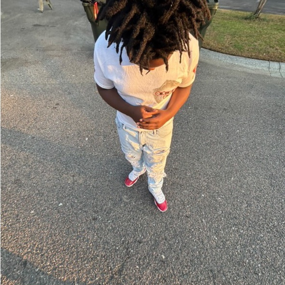 White T-Shirt and Light Blue Distressed Jeans with Red Sneakers made to order